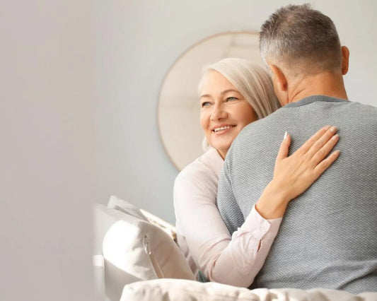 Mature couple sharing a warm, affectionate moment at home